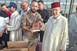 Distribution de Corans aux Marocains de retour à l’aéroport d’Al-Aroui