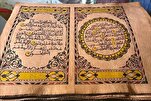 Faslı engelli sanatçının keçi derisi üzerine Kur’an yazması